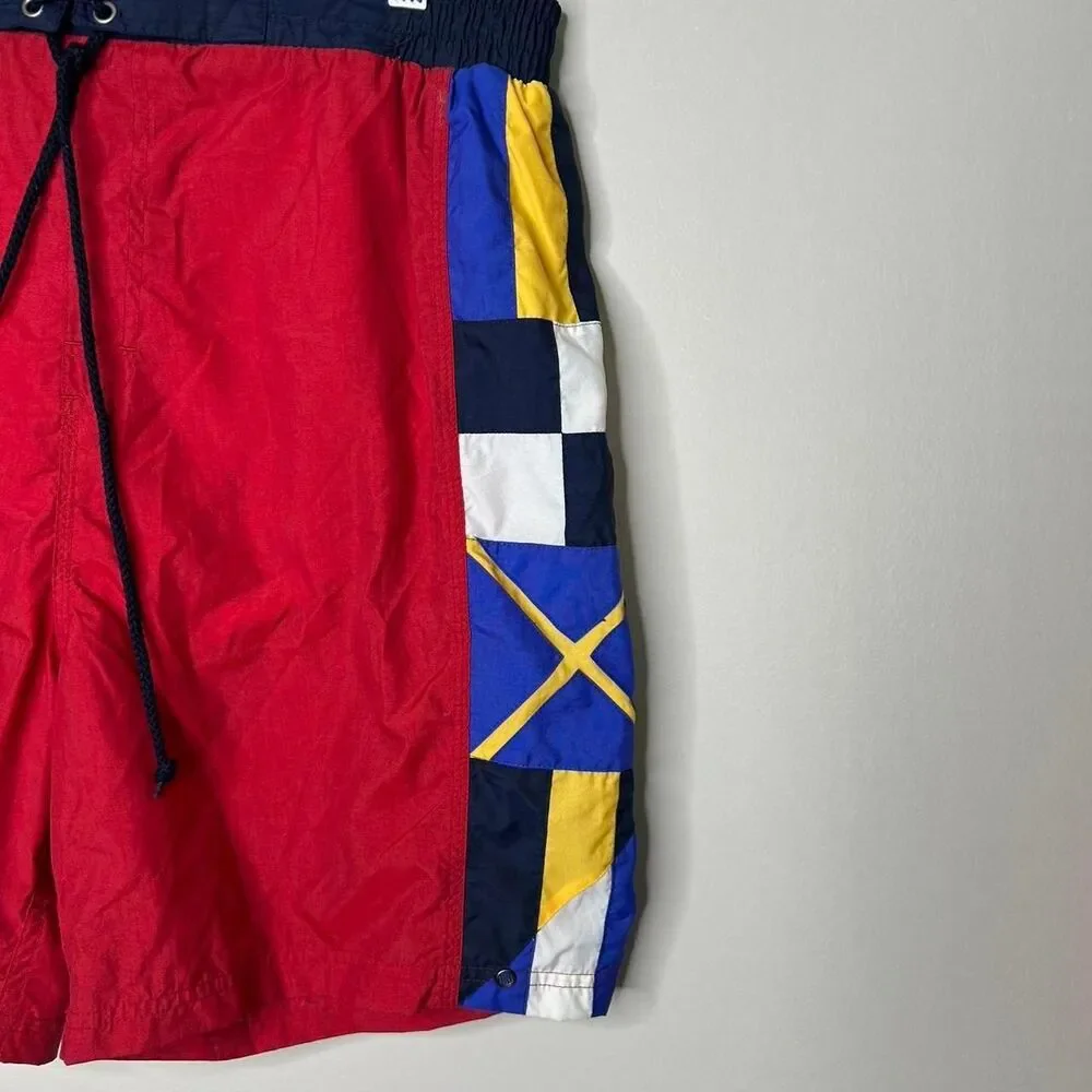 Vintage Ralph Lauren Chaps red swim trunks with navy blue, yellow, and white